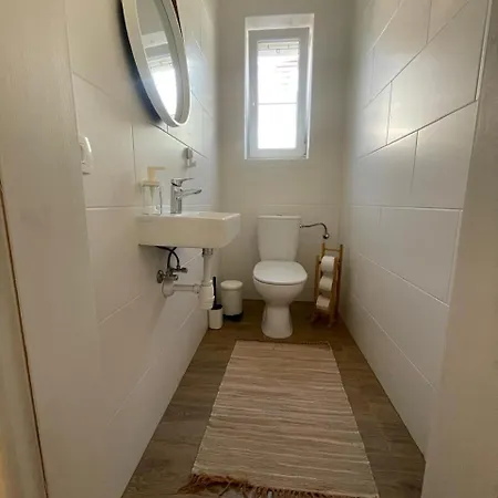 At The Burkulis' Lejlighed